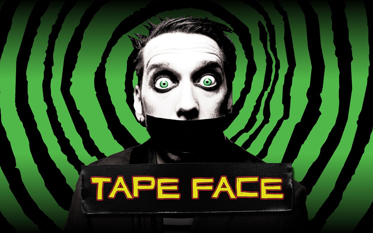 Performer with taped mouth and wide eyes, promoting Tape Face Vegas show.