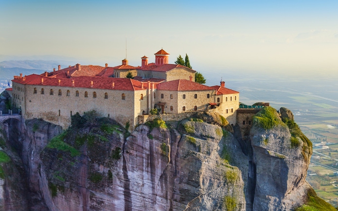 Monastery atop rock formation in Meteora, Greece, part of Sensational Meteora Private Day Tour from Athens.