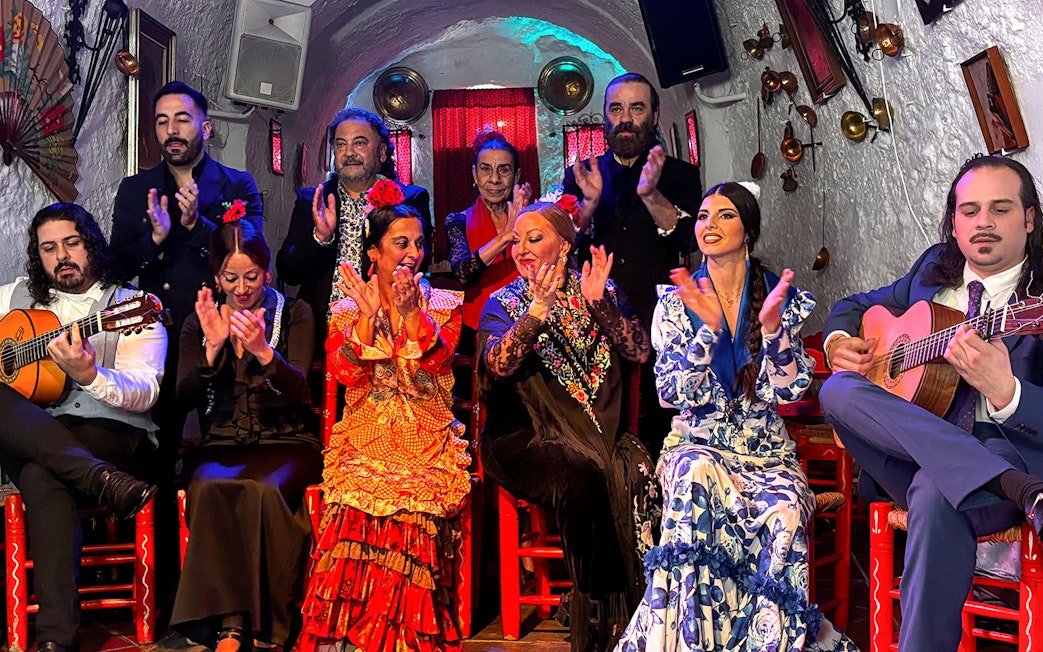 Flamenco dancers and musicians performing at Flamenco Cuevas Los Tarantos, Granada.
