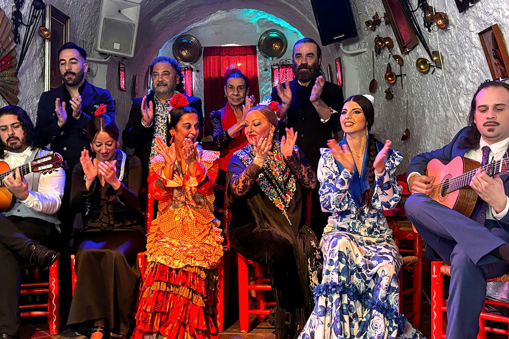 Flamenco dancers and musicians performing at Flamenco Cuevas Los Tarantos, Granada.