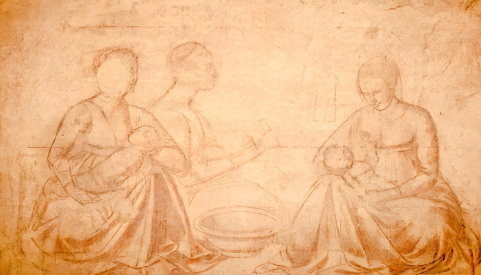 Paintings of figures with infants at Sinopie Museum, Pisa.