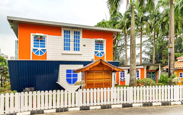 Upside Down House in Kuala Lumpur with inverted architecture and vibrant colors.