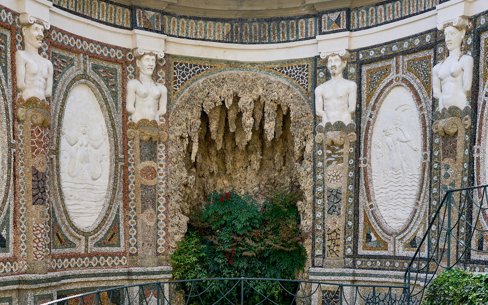 Villa d’Este ornate wall with statues and intricate mosaics, Tivoli, Italy.