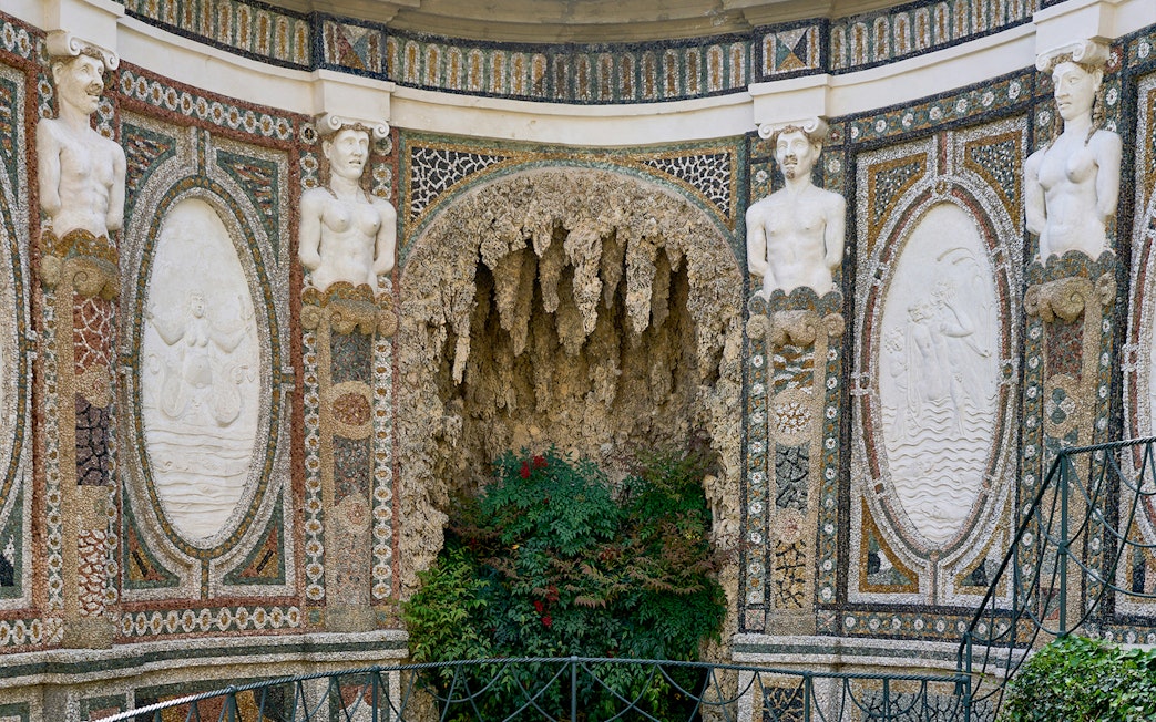 Villa d’Este ornate wall with statues and intricate mosaics, Tivoli, Italy.