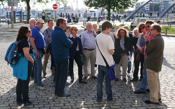 Group listening to a guide during Elbphilharmonie tour in Hamburg.