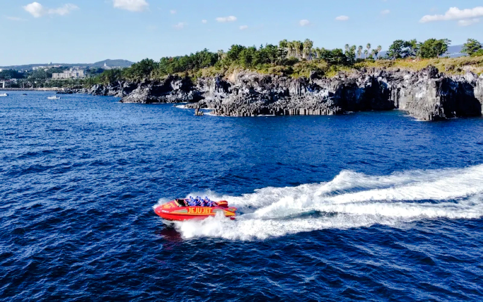 Jeju Parasailing or Jet Boat Tickets at Jusangjeolli Cliffs