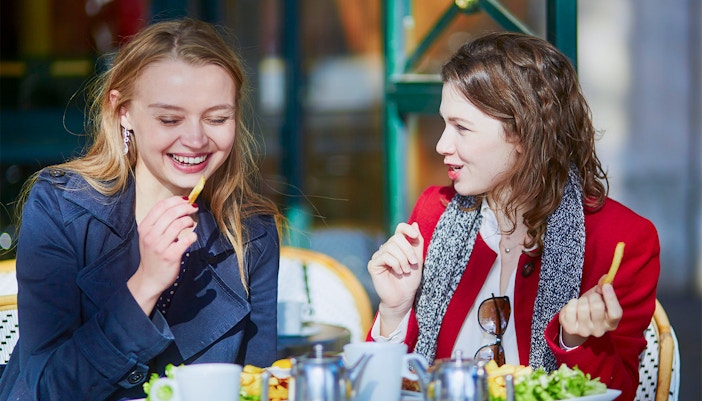 Visitors dining at cafes and restaurants