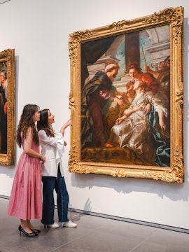 Women viewing Rubens' "The Education of the Virgin" at Louvre Abu Dhabi.