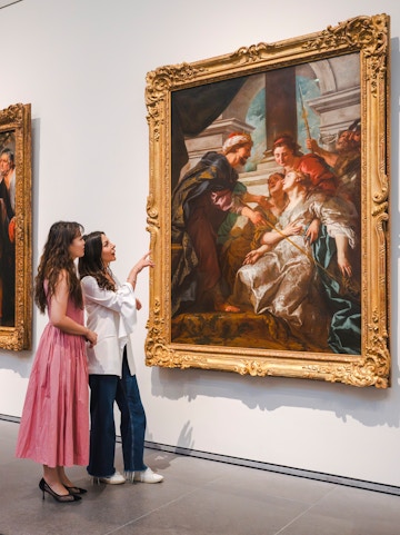 Women viewing Rubens' "The Education of the Virgin" at Louvre Abu Dhabi.
