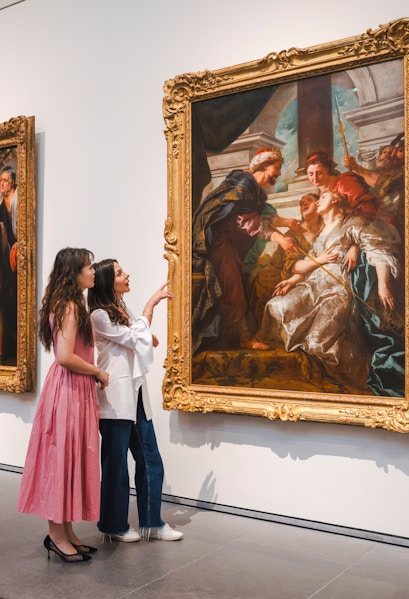 Women viewing Rubens' "The Education of the Virgin" at Louvre Abu Dhabi.