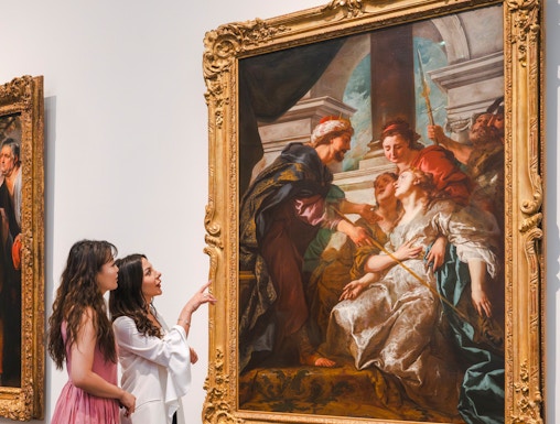 Women viewing Rubens' "The Education of the Virgin" at Louvre Abu Dhabi.
