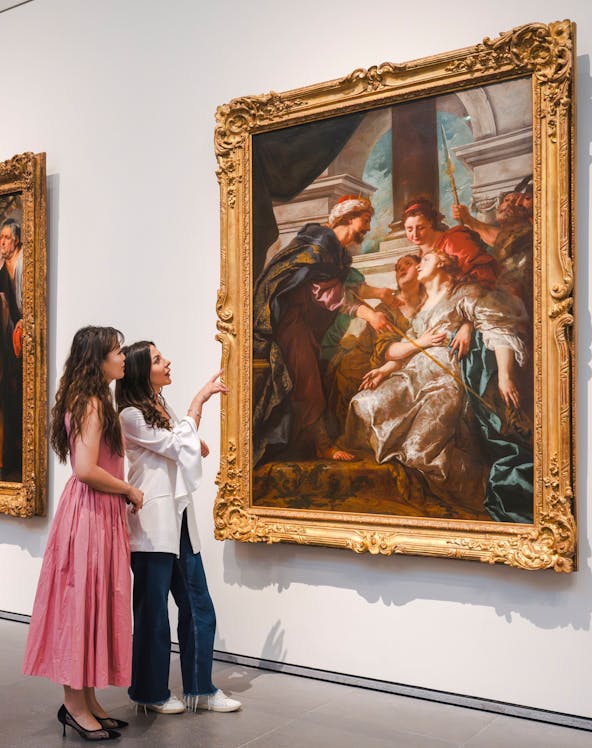 Women viewing Rubens' "The Education of the Virgin" at Louvre Abu Dhabi.
