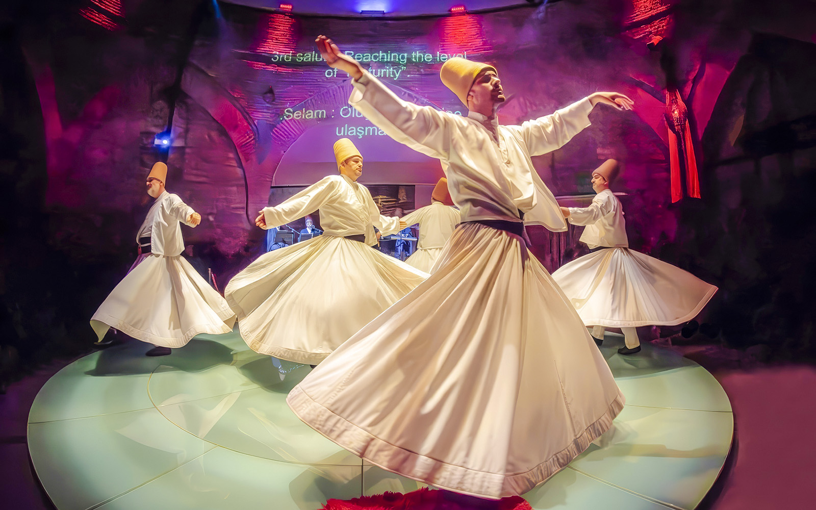 Whirling dervishes performing at Hodjapasha Cultural Center in Istanbul.