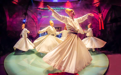 Whirling dervishes performing at Hodjapasha Cultural Center in Istanbul.
