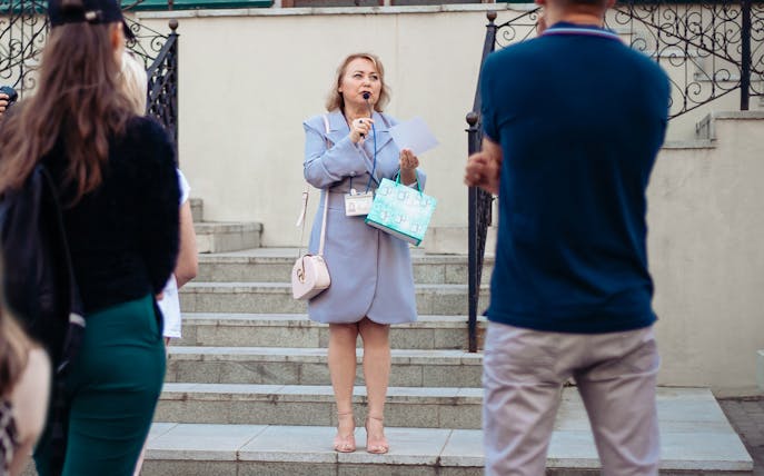 Tour guide speaking to a group during Royal Palace of Madrid skip-the-line tour.