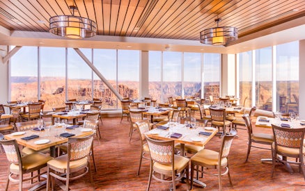 Dining area with canyon views at SkyView Restaurant, Grand Canyon West Rim, Arizona.