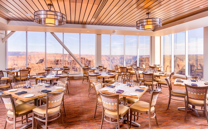 Dining area with canyon views at SkyView Restaurant, Grand Canyon West Rim, Arizona.