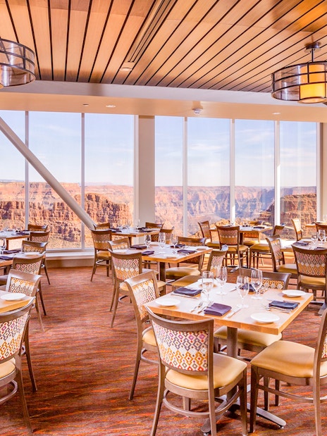 Dining area with canyon views at SkyView Restaurant, Grand Canyon West Rim, Arizona.