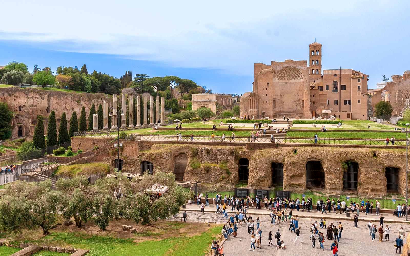 Small group tour at Palatine Hill and Roman Forum, Rome, Italy, with ancient ruins and columns.