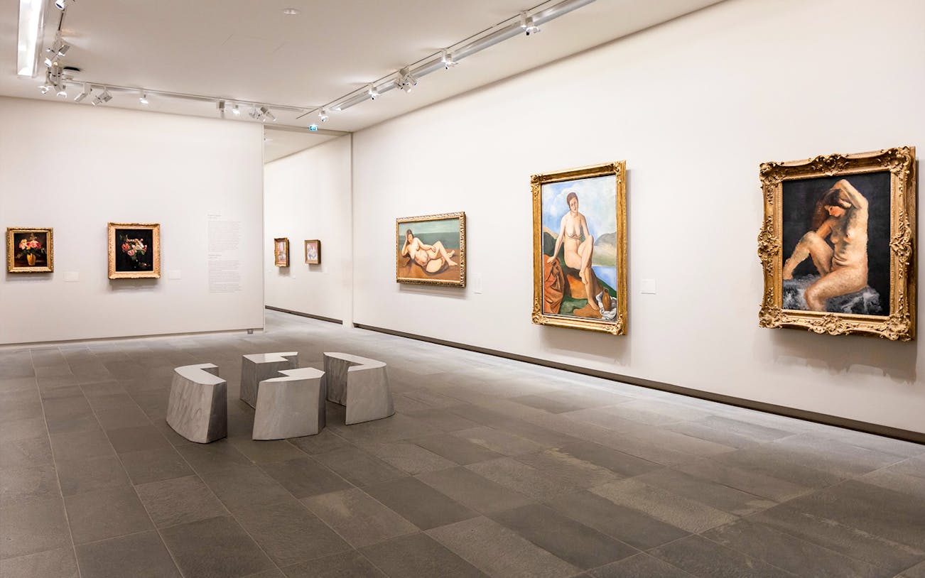 Paintings displayed inside Orangerie Museum gallery room.