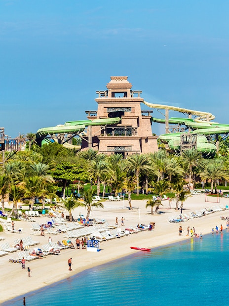 Aquaventure Waterpark with slides and beach on Palm Jumeirah, Dubai.