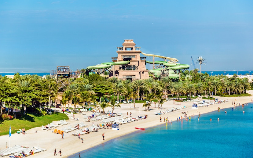 Aquaventure Waterpark with slides and beach on Palm Jumeirah, Dubai.
