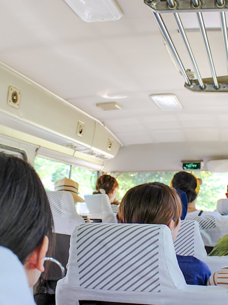 Passengers seated inside an AC minibus during Ksamil Islands day trip from Tirana.