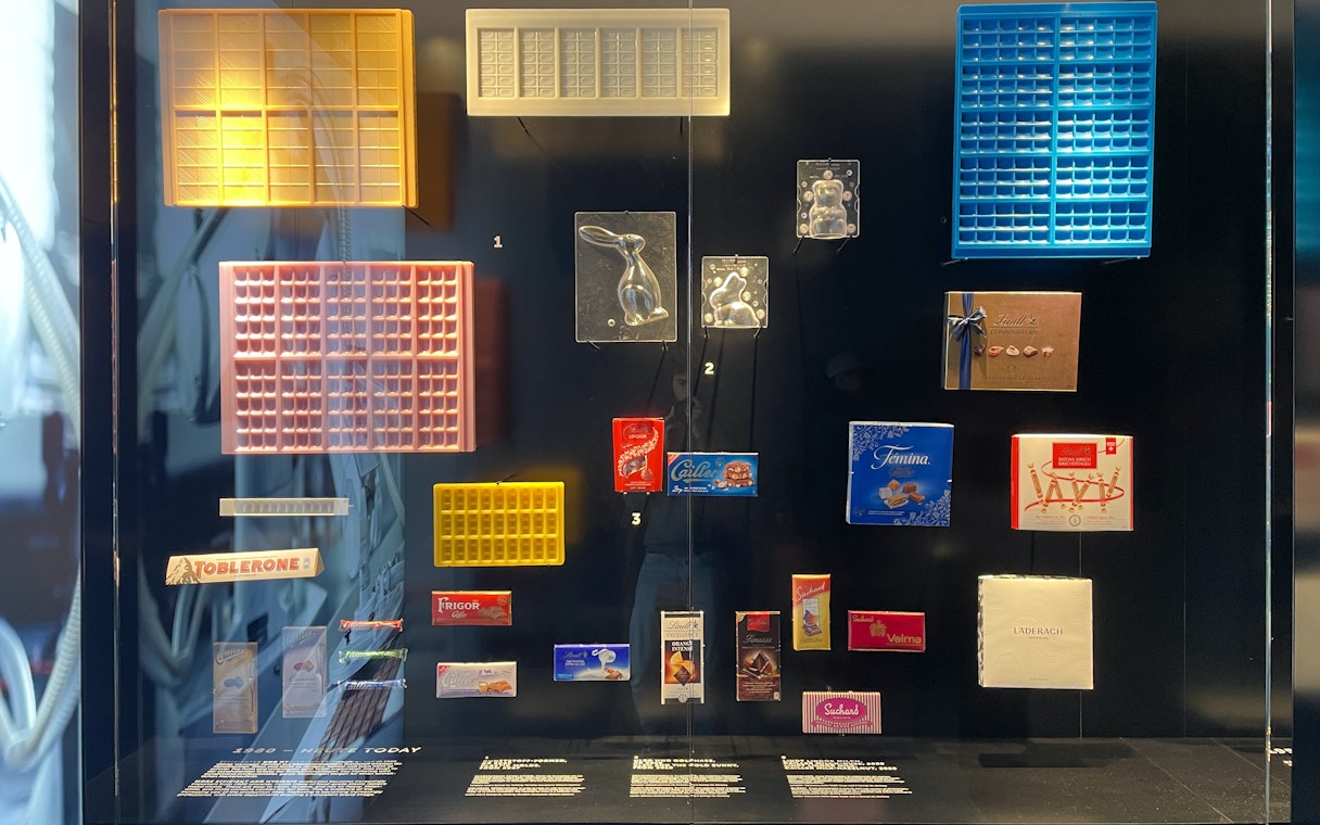 Chocolate molds and packaging display at Lindt Home of Chocolate Museum, Zurich.
