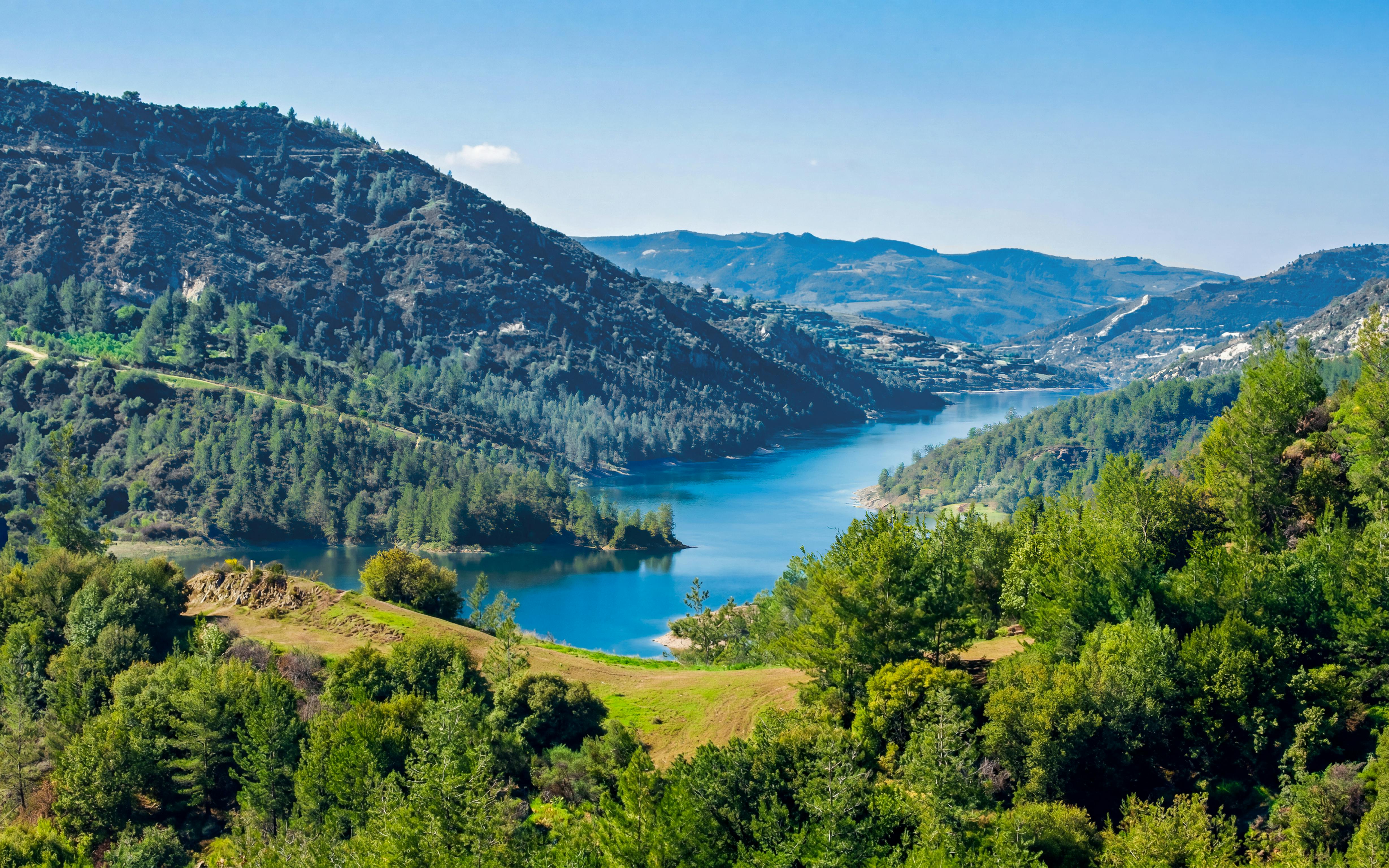 Kannaviou Dam surrounded by lush greenery in the Troodos Mountains, Cyprus.