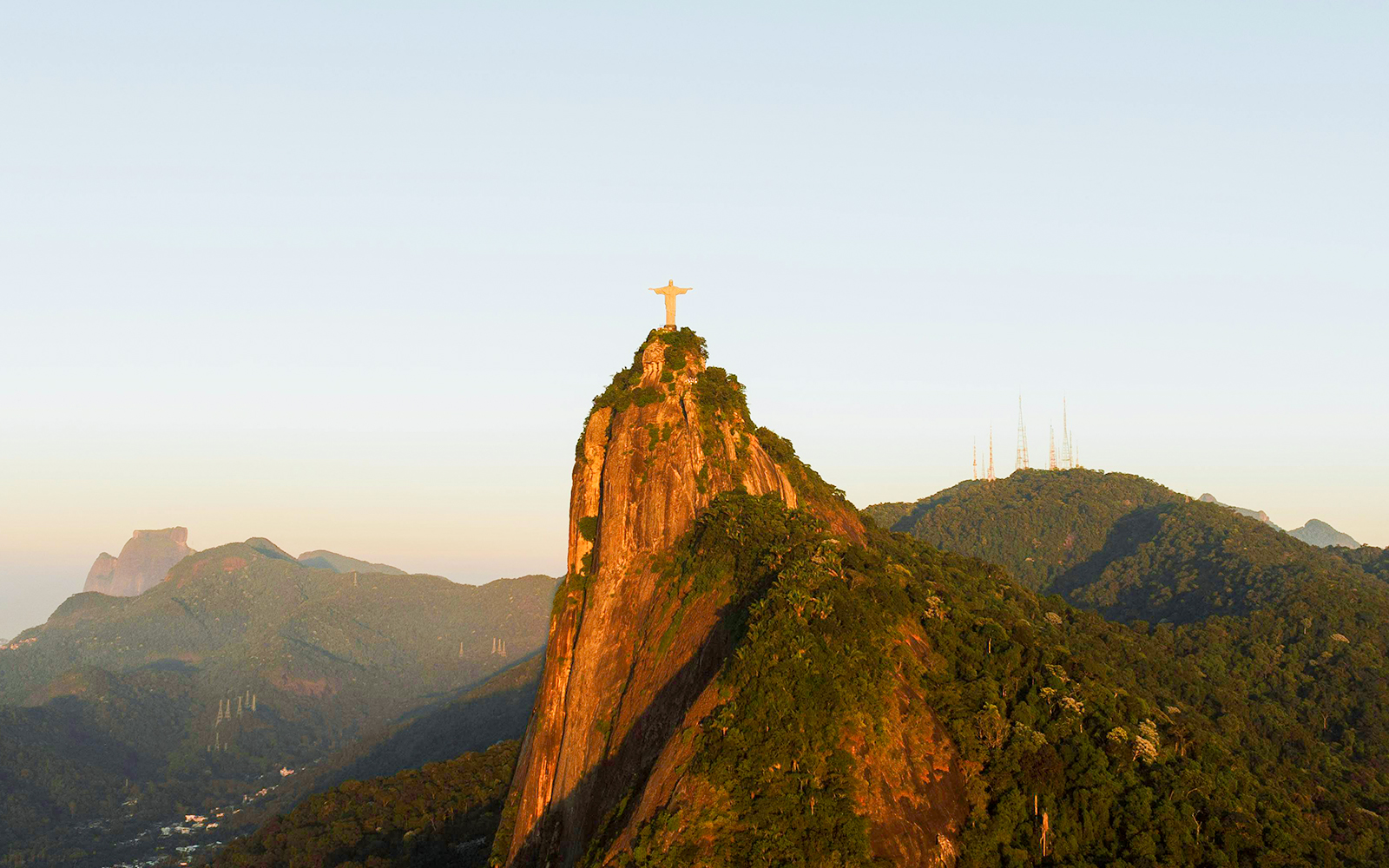 Christ the Redeemer statue atop Corcovado Mountain viewed from Sugarloaf Mountain, Rio de Janeiro.
