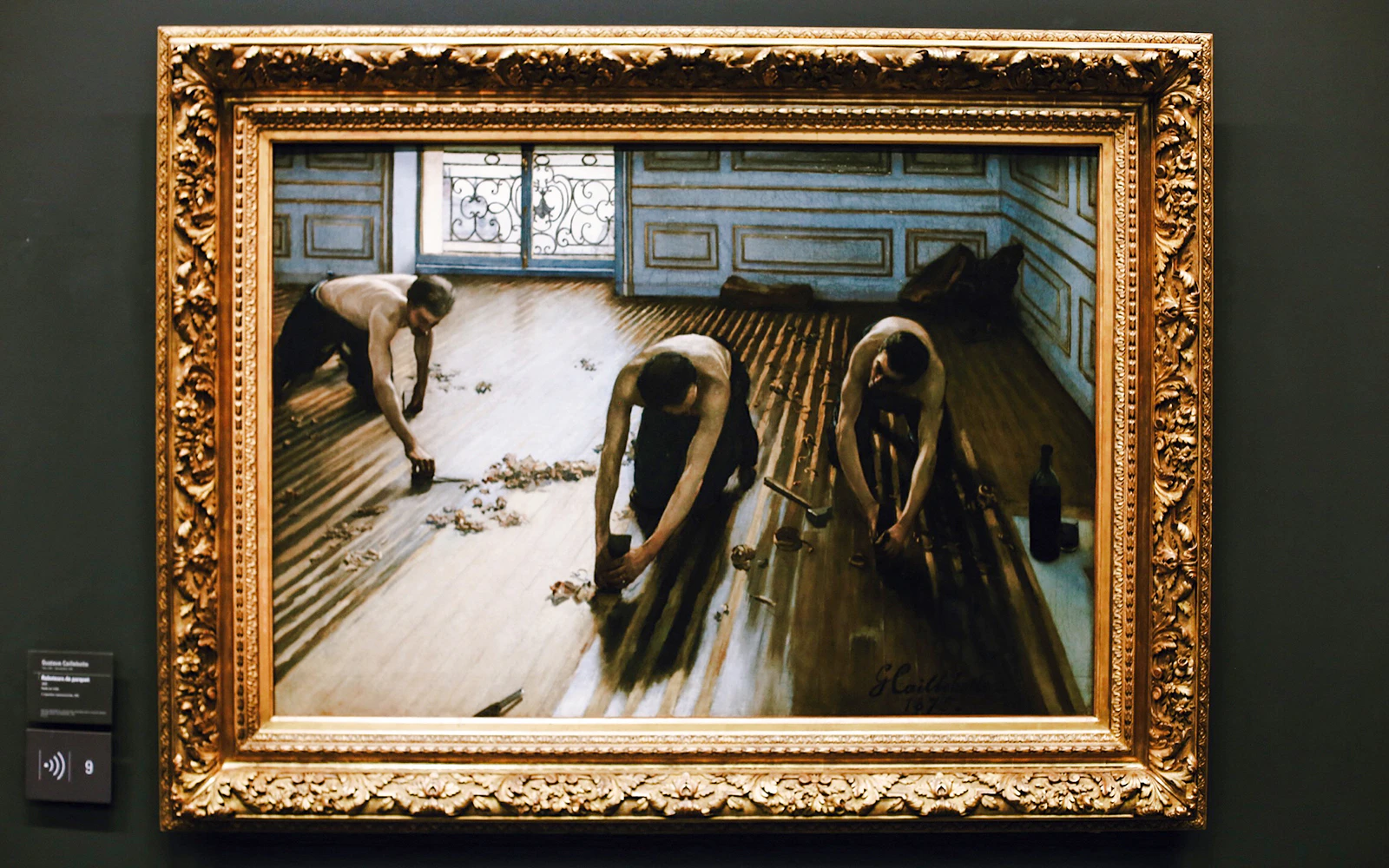 Painting of workers scraping a wooden floor, displayed in Orsay Museum, Paris, France.