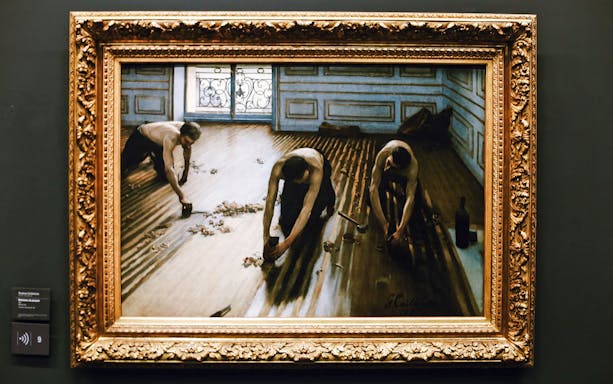 Painting of workers scraping a wooden floor, displayed in Orsay Museum, Paris, France.