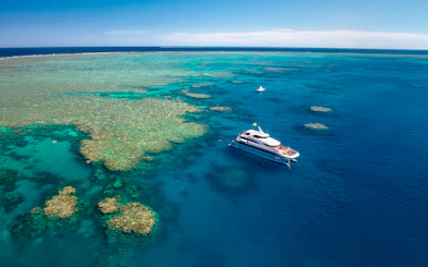 Cruise ship near coral reefs on Great Barrier Reef, Cairns.