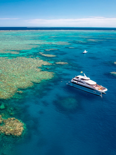 Cruise ship near coral reefs on Great Barrier Reef, Cairns.