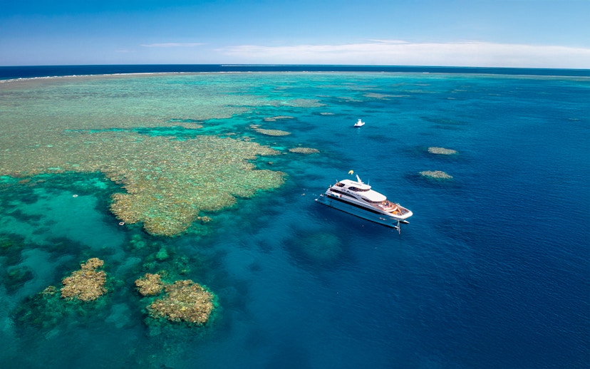 Cruise ship near coral reefs on Great Barrier Reef, Cairns.