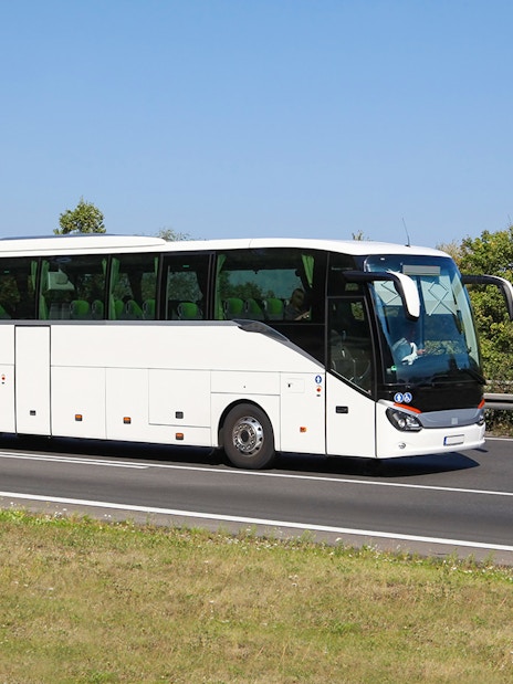 Tour bus on highway for Amsterdam to Zaanse Schans, Edam, Volendam, Marken tour.