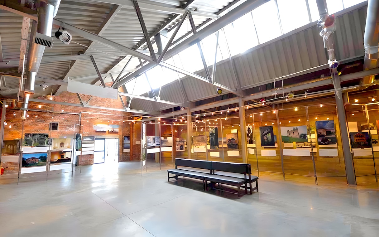 Exhibit hall with photographs at Galicia Jewish Museum in Kraków.