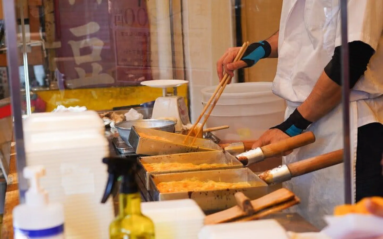 Cooking tamagoyaki at a Tsukiji market stall in Tokyo.