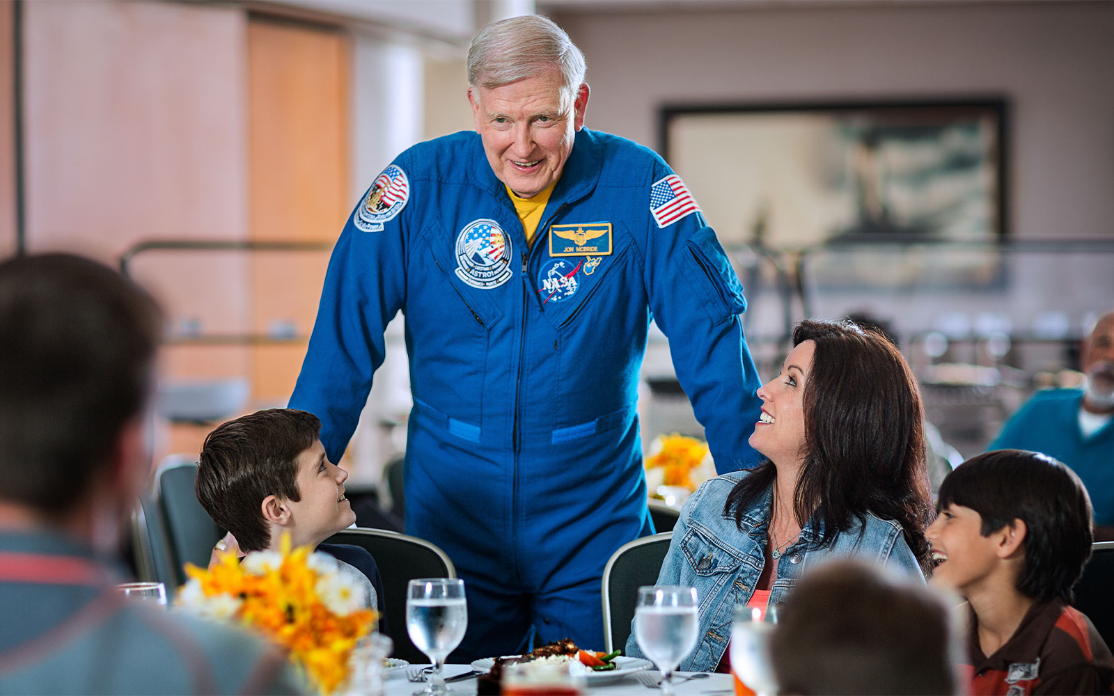 Astronaut speaking to visitors at Kennedy Space Centre.