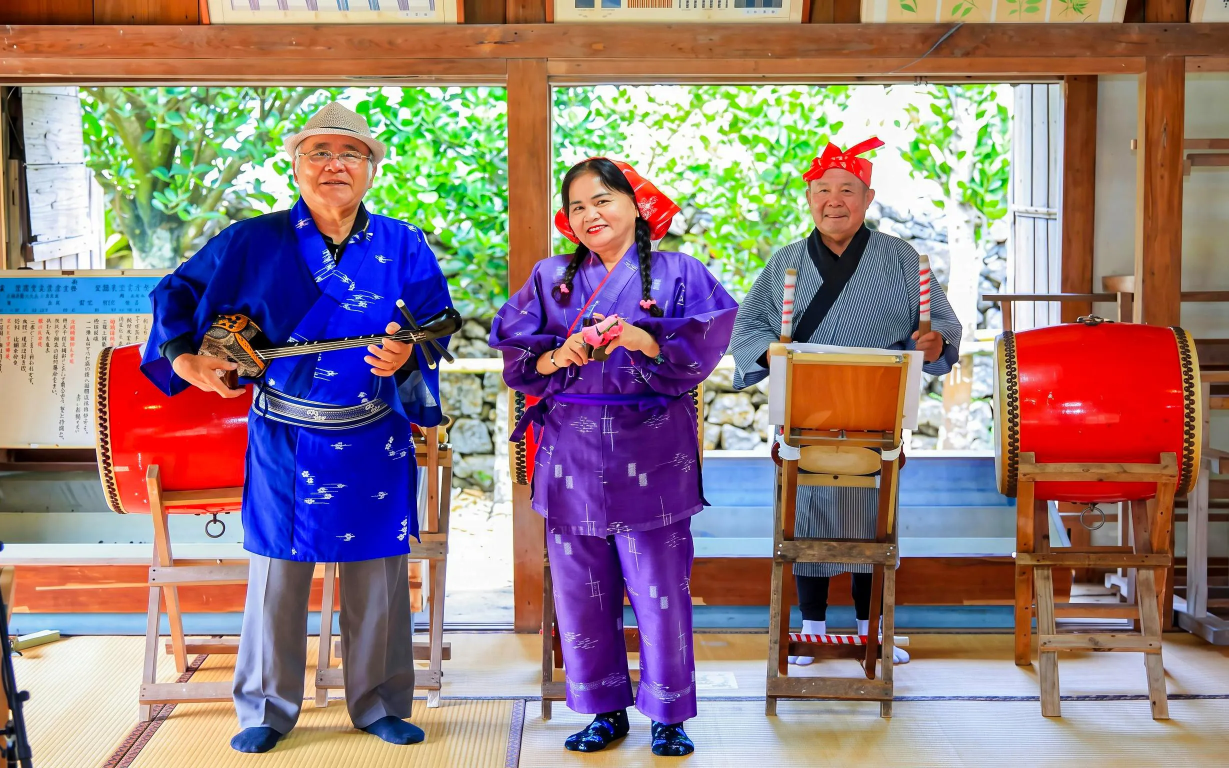 Traditional musicians performing at Ishigaki Yaima Village, Japan.