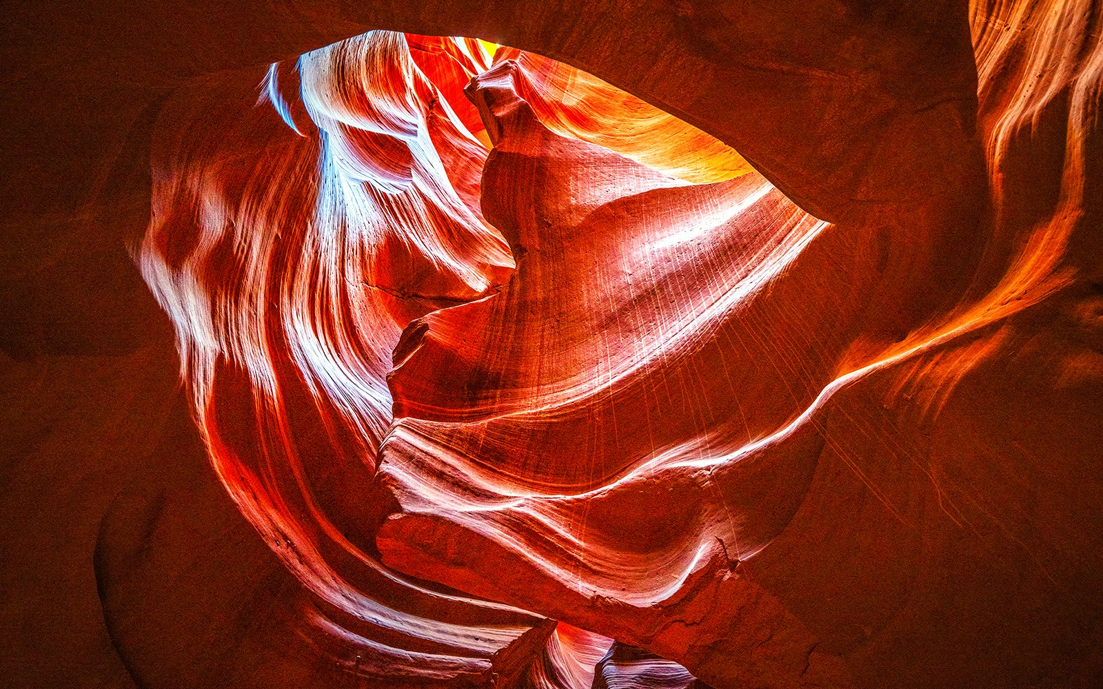 Antelope Canyon X sandstone formations with light beams, Arizona.