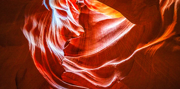 Antelope Canyon X sandstone formations with light beams, Arizona.