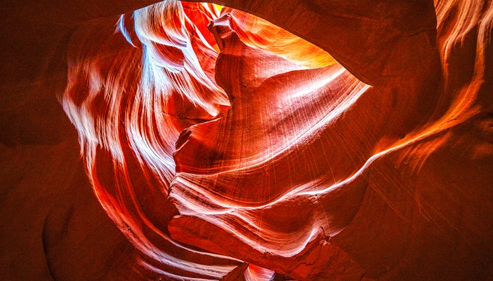 Antelope Canyon X sandstone formations with light beams, Arizona.