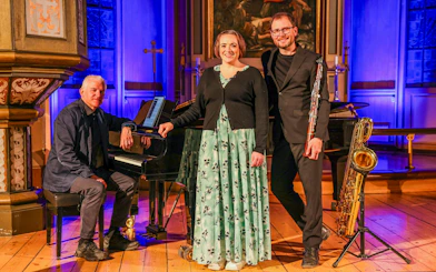 Performers with instruments at Midnight Concert in Tromsø Cathedral, Norway.