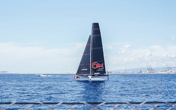 Sailing yacht on the water during Barcelona America's Cup experience.
