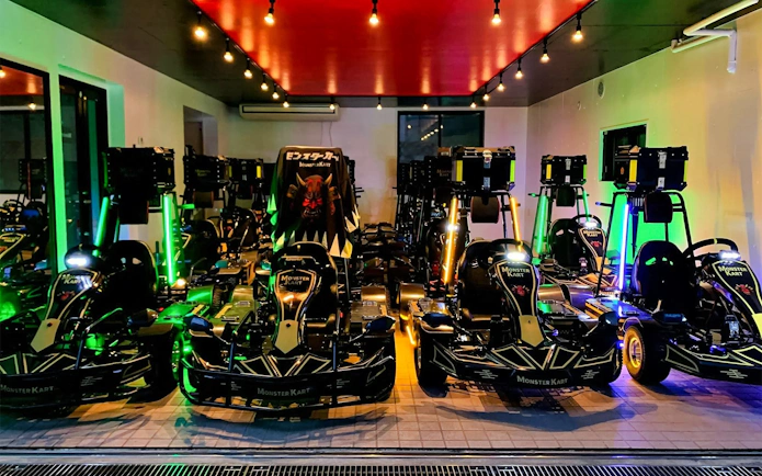 Electric go-karts lined up indoors for Asakusa 60 min tour.
