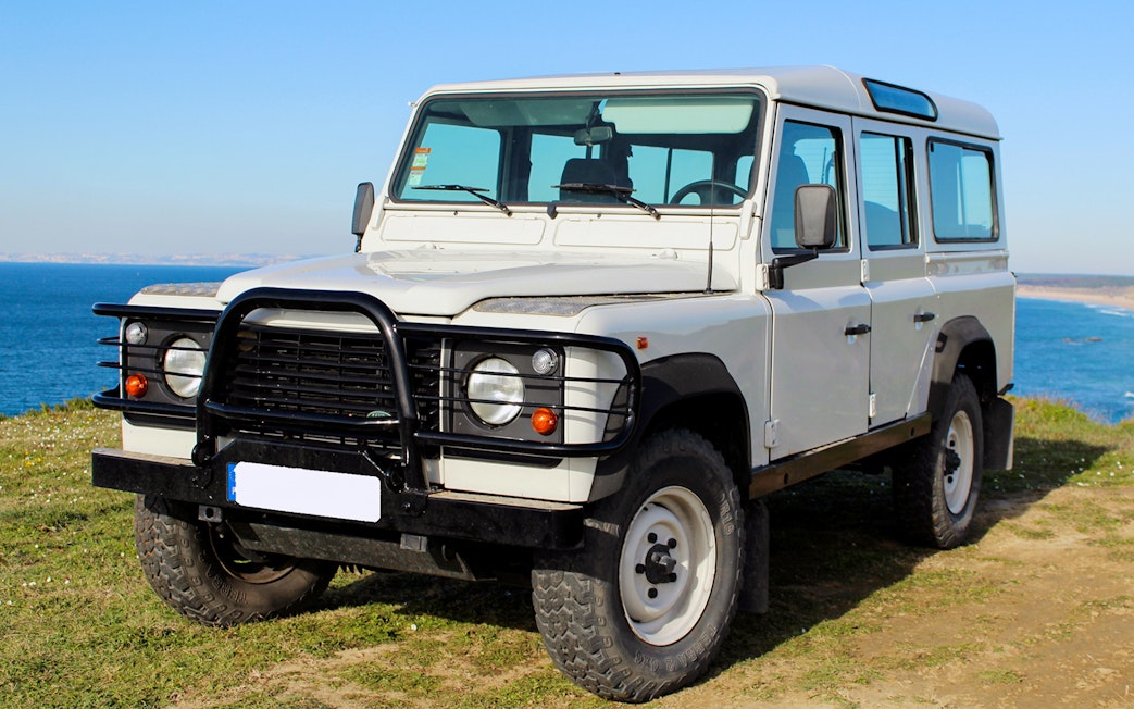 4x4 Jeep on Cape Espichel cliffside, part of guided tour in Sesimbra, Portugal.