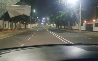 Night view of a quiet street in Dar es Salaam during a city tour.