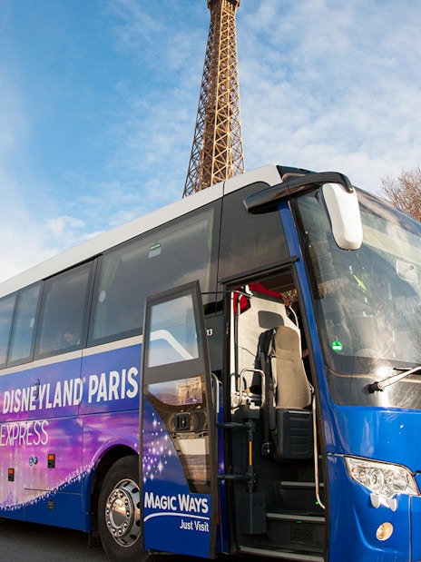 Disneyland Paris shuttle bus near Eiffel Tower in Paris.