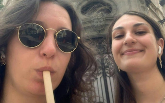 Two people enjoying a self-guided city exploration game in Brussels.